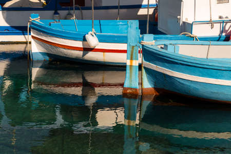 Small traditional fishing boat, made of wood, coloured, painted, Sicily