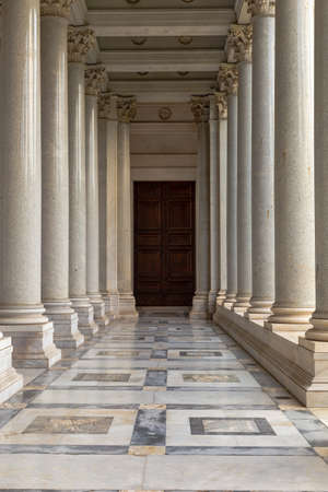 Row of column in colonnade. Classical style colonnade in Rome, Italy