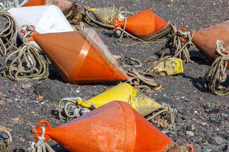 The buoy. Some colored devices to moor boats