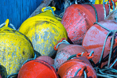 The buoy. Some colored devices to moor boats
