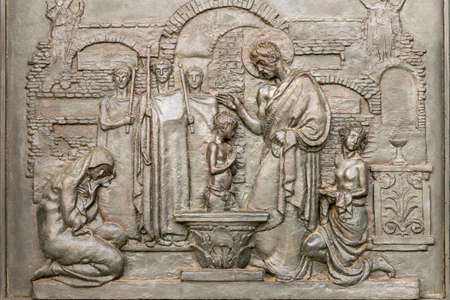 ancient bas-relief depicting the baptism of Christ