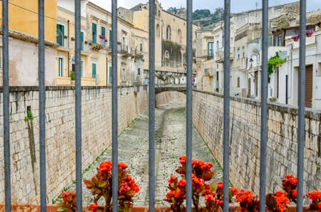 Scicli (Sicily): ancient creek bed covered in medieval stone