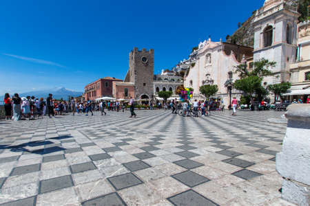 TAORMINA (SICILY) - The main square full of tourists.のeditorial素材