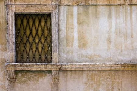 windows in the facades of ancient Venetian houses