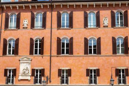 windows in the facades of ancient Venetian houses