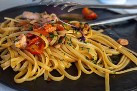 Cooking. Tagliolini with seafood. detailの写真素材