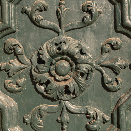 Fractals or floral bas-reliefs on ancient Sicilian baroque doorsの写真素材