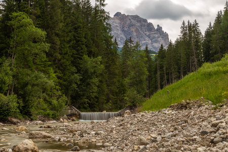 Peaceful mountain stream in the alps of Italian Alta Badiaの写真素材