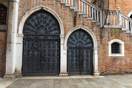 Doors and windows of ancient Venetian housesの写真素材