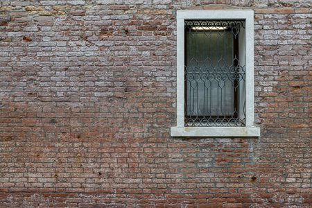 Doors and windows of ancient Venetian housesの写真素材