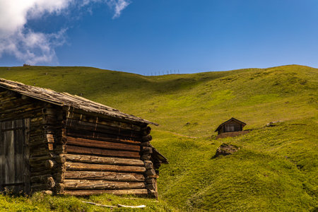 Stunning Dolomites: towering peaks, timeless rocks, and pristine nature under radiant alpine skies.の写真素材