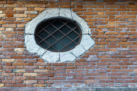 Doors and windows of ancient colorful Venetian housesの写真素材