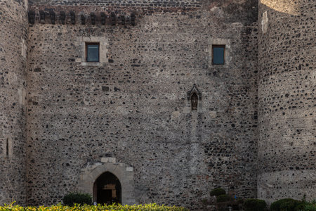 Medieval castle wall with arched doorwayの写真素材