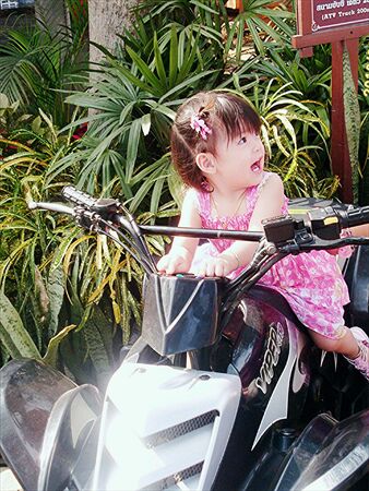 Lovely girl ride on the motorcycleの素材