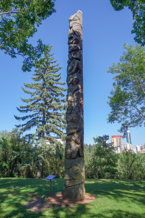 The Ksam Totem Pole in Edmonton Alberta Canada is a 37 foot high pole in typical Northwest Coast Natives art styleのeditorial素材