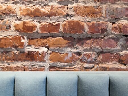 Weathered texture of stained old dark brown and red brick wall background, grungy rusty blocks of...