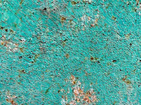 Veneer peeling paint dark green color painted old wooden wall, wood wall texture backgroundの写真素材