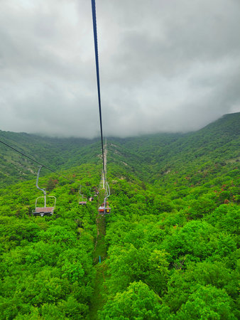 Cable car over green
