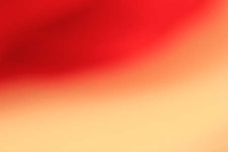 Blurred Red and Cream Backgroundの写真素材