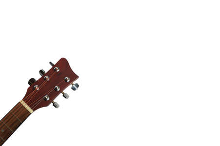 Close up of an acoustic guitar tuning keys isolated on a white backgroundの写真素材