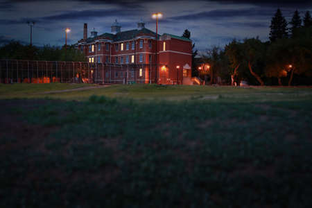 Saskatchewan Hospital in North Battleford, Saskatchewan, Canada - June 6, 2019. Back view of the now vacant building which was built between 1911 and 1913. This was the first mental heath facility built in Saskatewan.のeditorial素材
