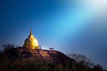 golden pagoda top on the moutain in Bung Kong Long, Thailand, Phu Langkaの写真素材