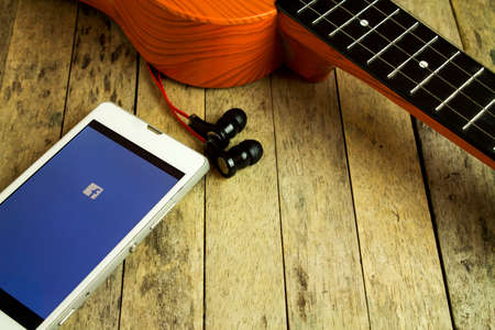 BUNGKAN THAILAND-AUGUST 2015:   music with earphones and ukuleleのeditorial素材