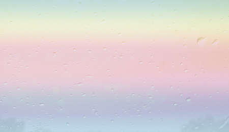 rain drops on front car glass, color abstract backgroundの写真素材