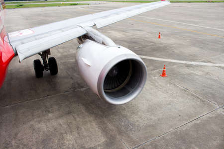 wing and engine a part of the planeの写真素材