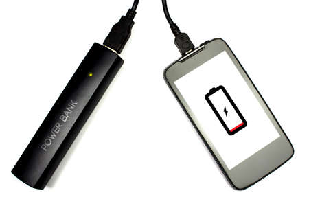 charging cellphone battery with power bank, isolatedの写真素材