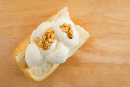 ice cream on bread thai sweet on wood background, copy spaceの写真素材