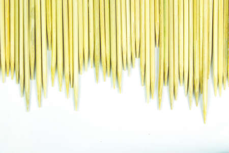 small stick wood on white background with blank space for textの写真素材