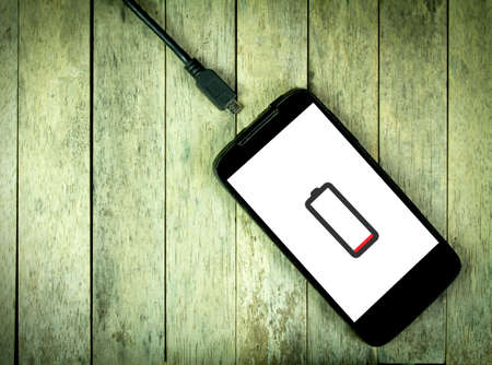 Smart phone need to charge batteryの写真素材