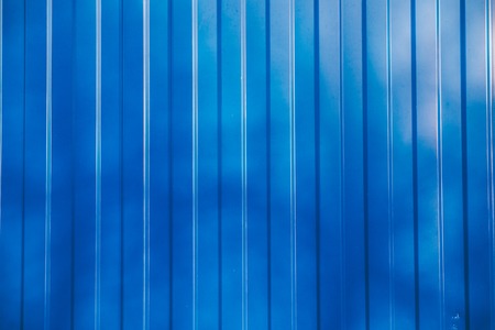 Blue metal siding wall texture backgroundの写真素材