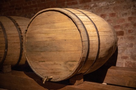 wooden barrel in the basementの写真素材