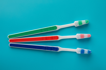 toothbrushes in the form on a blue backgroundの写真素材