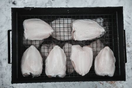 grilled raw chicken for smoking. Cooking in nature. Smoke cooking in a smokehouse