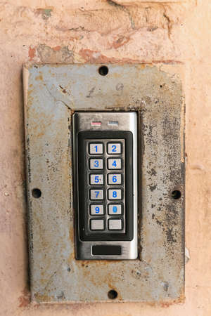 Doorbell button panel and intercom.