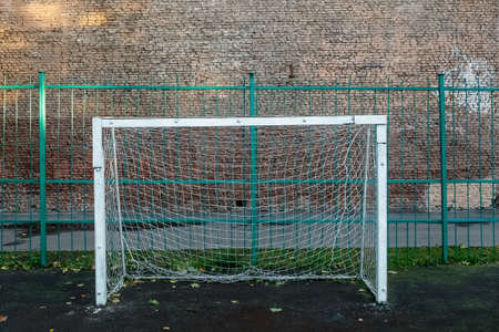 empty old playing football field in the cityの写真素材