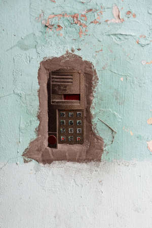 old intercom at the entrance to a residential buildingの写真素材