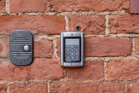 old intercom at the entrance to a residential buildingの写真素材