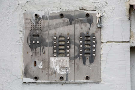 old intercom smeared in paintの写真素材