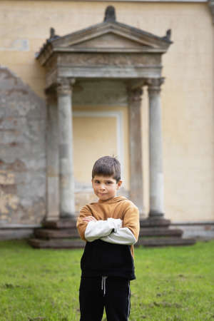 a six-year-old boy on a walk in the park.の写真素材