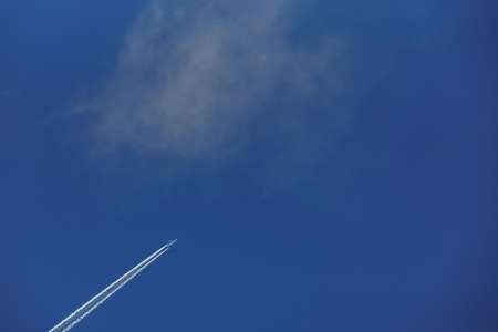 airplane footprints on a blue sky background