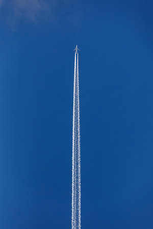 airplane footprints on a blue sky background
