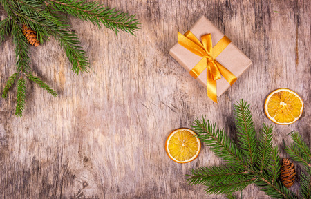 Gift box with gold bow on beautiful Christmas background.  Copy spaceの写真素材