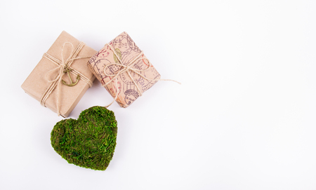 Green heart and gifts. Romantic concept. Natural Valentine card. St. Valentine's Day. Copy spaceの写真素材