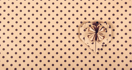 Paper polka dot background. Paper heart. Heart origami. Valentine origamiの写真素材