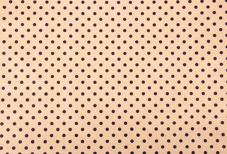 Beige paper background. Paper polka dot background. Paper textureの写真素材