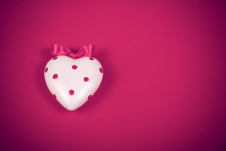 Heart on pink background. Symbol of love. St. Valentine's Dayの写真素材